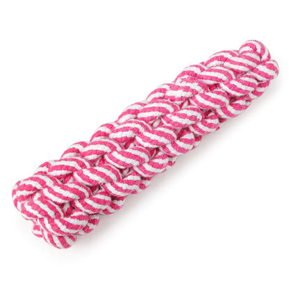 Pink and white striped dog toy on a white background