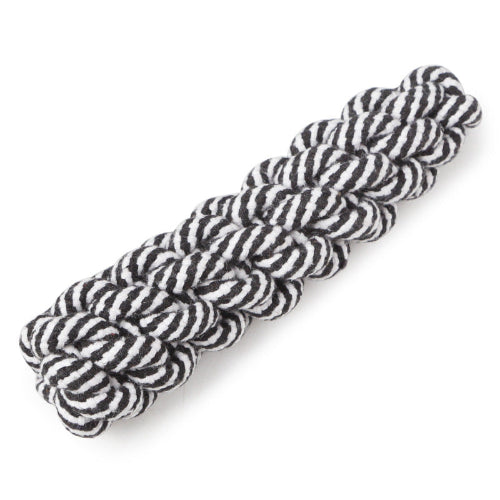 Two skeins of black and white striped yarn on a white background