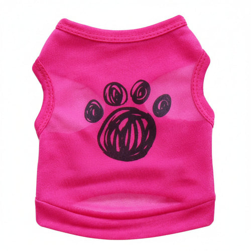 Pink pet shirt with black paw print design and text on a white background